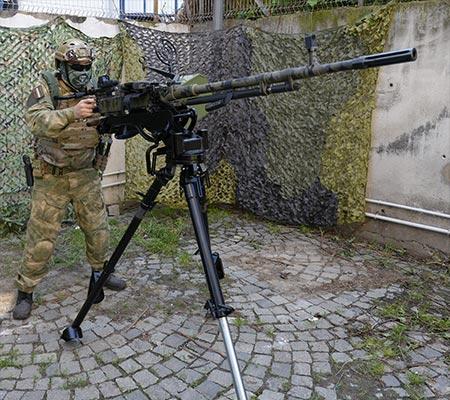 Tripod & cradle allow attachment of optic