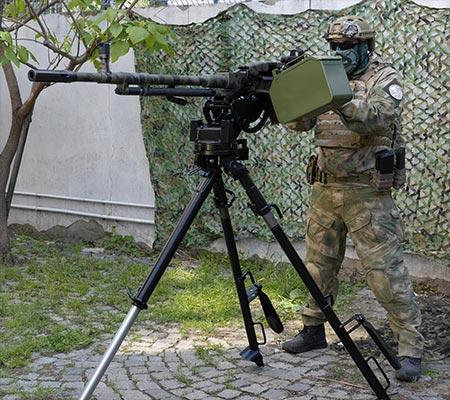 Tripod & cradle allow attachment of optic