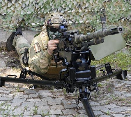 Tripod & cradle allow attachment of optic Tripod & cradle allow attachment of optic