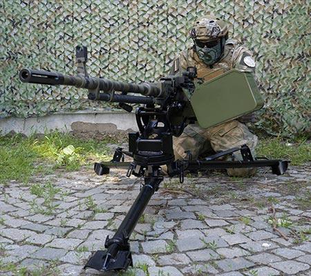 Tripod & cradle allow attachment of optic Tripod & cradle allow attachment of optic